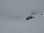 Le col du Ban Darray est au fond et l'Aiguille des Angroniettes sur la gauche et sous la brume.