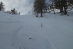 Je remonte les traces des skieurs
