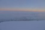 Je descends et arrive tout juste à voir les Alpes
