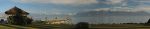 Vue panoramique sur le débarcadère, les Alpes et le lac