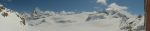 Depuis le réfectoire de la cabane, vue panoramique sur le Glacier du Mont Miné, la Dent Blanche, le Cervin, Tête Blanche et les Dents de Bertol